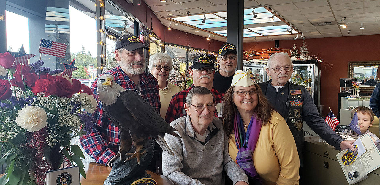 Chipper’s Jewelry in Bonney Lake had a small Veterans Day celebration. Back row is Ray Uebler (Buckley),Tahoma Gold Star Wife-Marion Larimer (Puyallup), Mike Morgan (Spanaway), Gary M. Shepherd (So Hill) and Dennis Linville (Puyallup); Richard Smith (Graham), and Arlene P. Murray (Graham). The eagle is belonged to Murray’s husband, Dennis Gene Murray. Contributed photo