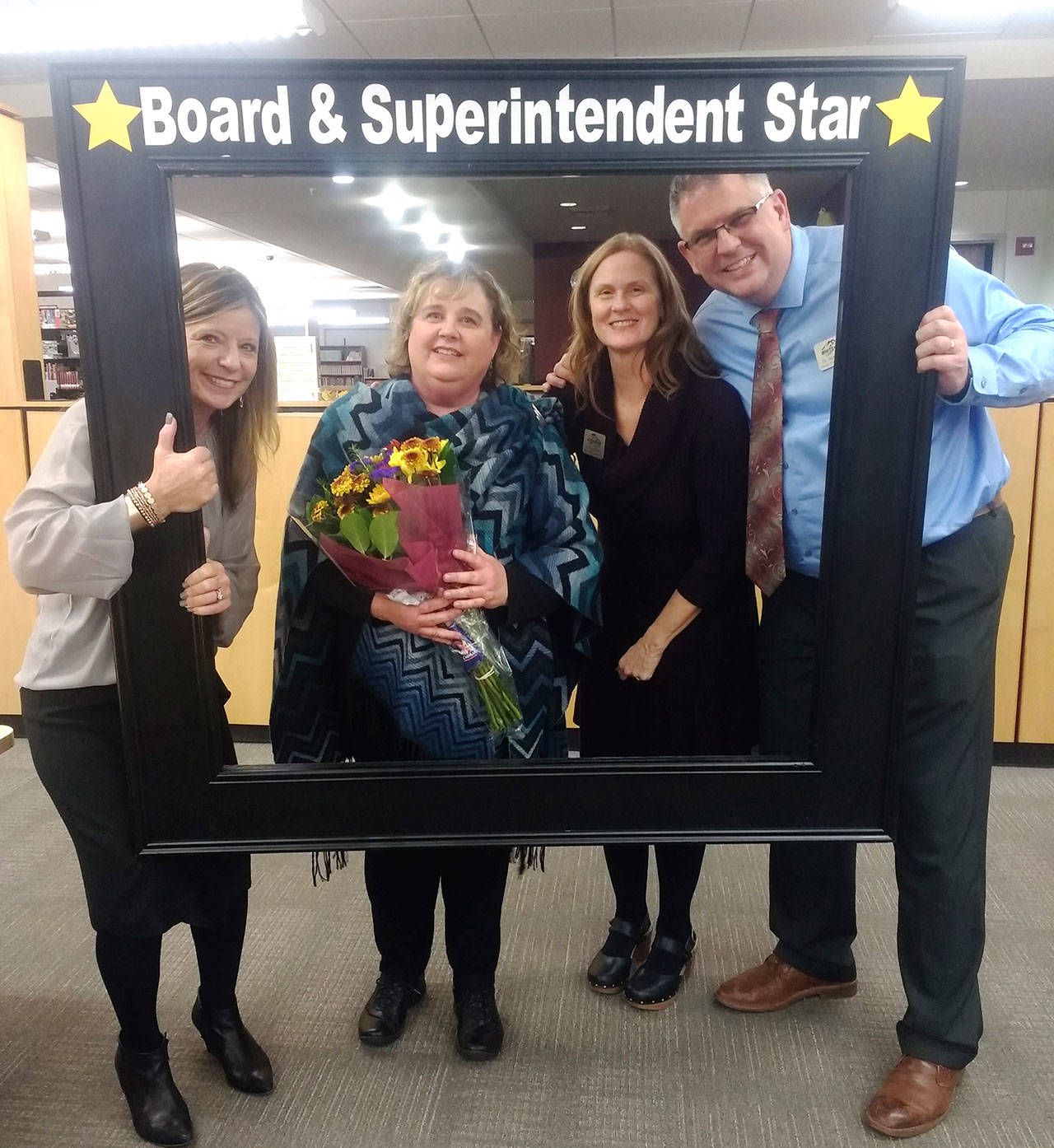 Taking part in a Nov. 13 ceremony were, from left: Janel Keating Hambly, superintendent; Monica Gaub; Connie Martin, director of Student Support Services; and Dr. Steve Leifsen, Director of Equity and Achievement. Photo courtesy White River School District