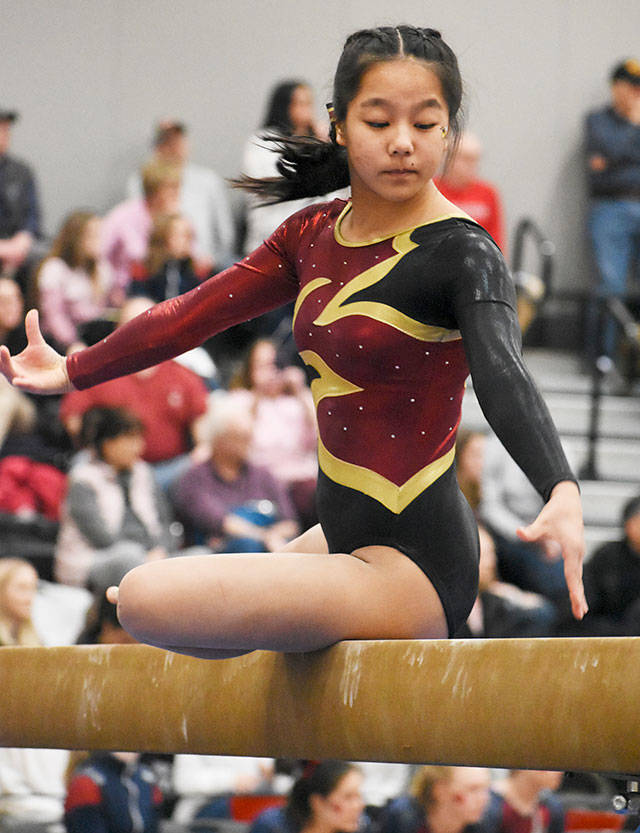 Since White River High doesn’t have its own gymnastics program, Hornet Erin McGinnis will be competing with the EHS team across the river. File photo by Kevin Hanson