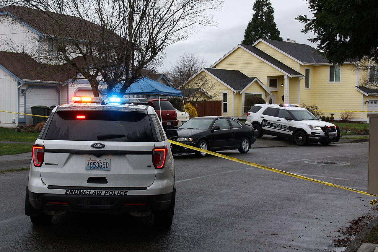 Officers are continuing to investigate the scene of the suicide, which happened on Garland Place in northern Enumclaw. Photo by Ray Miller-Still