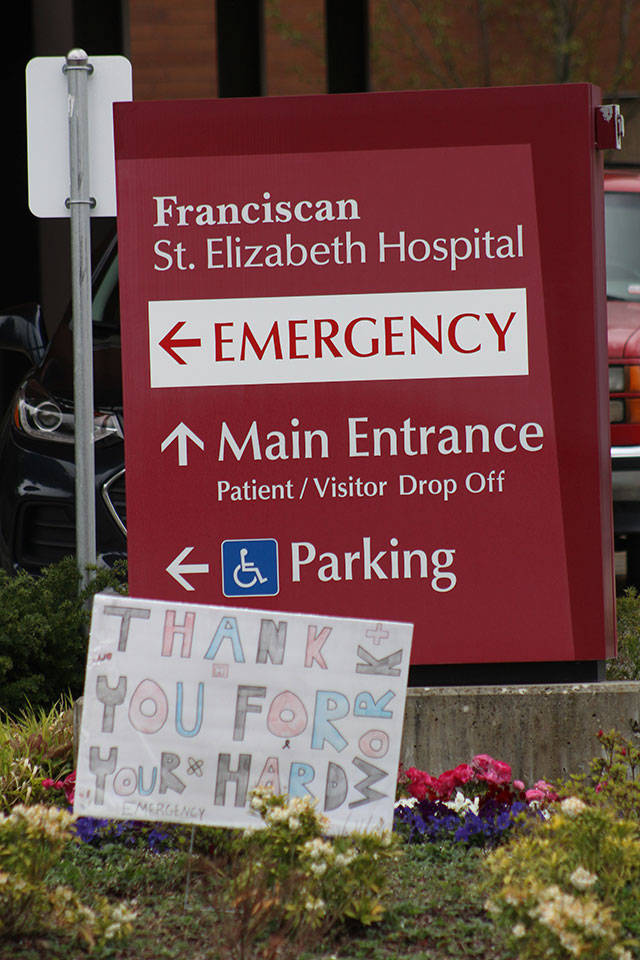 Professional and homemade signs thanking St. Elizabeth staff are scattered around the hospital. Photo by Ray Miller-Still