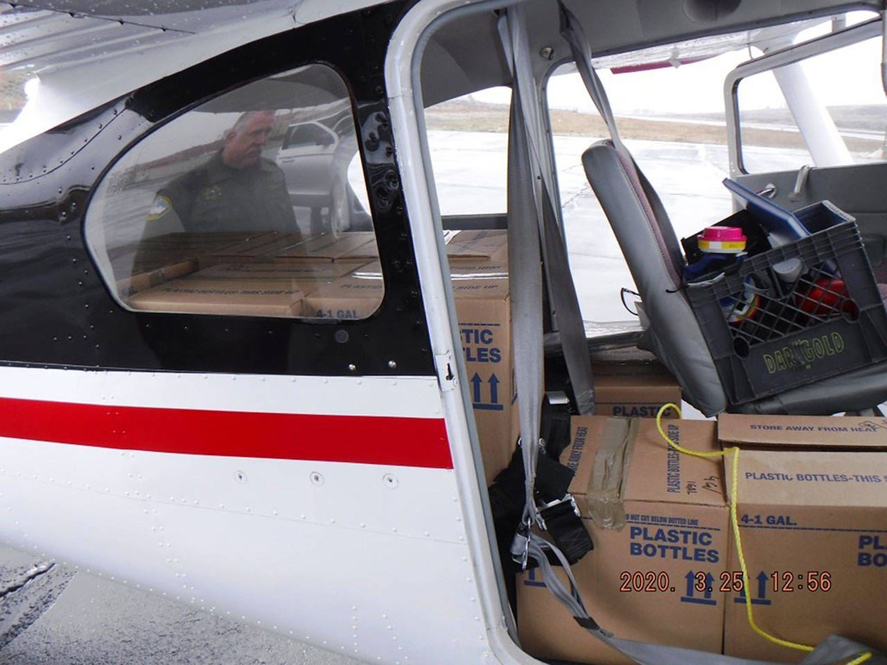 Boxes of hand sanitizer, made by Seattle Sanitizer LLC, were delivered to various Eastern Washington sheriffs’ department and other first responders. Photos courtesy Washington Air Search and Rescue