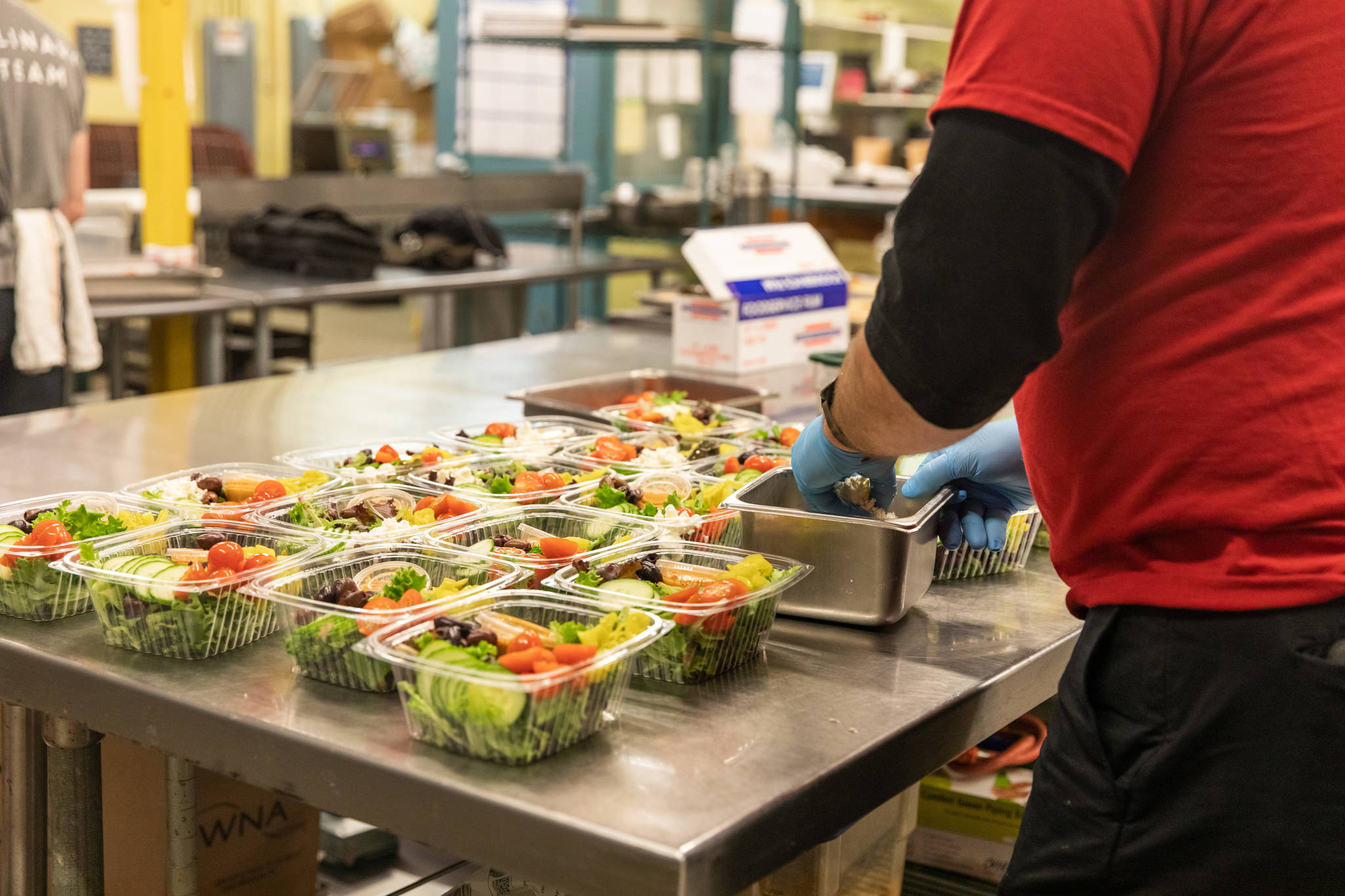 The team at Lisa Dupar Catering has found hearty entree salad and sandwich combinations to be the most effective for the meals they prepare for Medic One Foundations Gratitude Meals program. Photo courtesy of Hannah Sheil