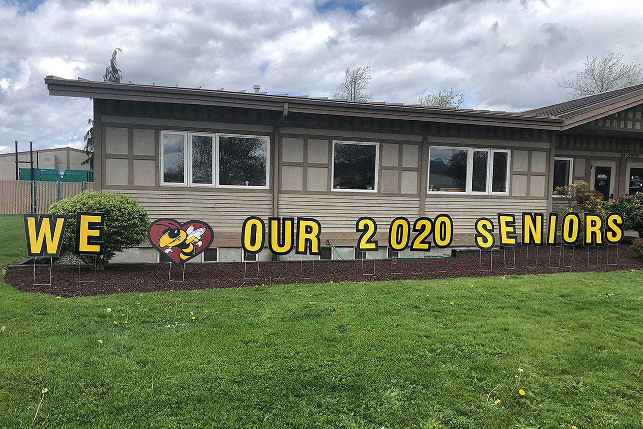 In addition to having these signs posted outside the district office and Enumclaw High School (provided by RK Graphics), the Enumclaw School District also plans to partner with the Enumclaw Senior Center in the near futur to have “seniors celebrating seniors.” Photo courtesy Enumclaw School Distirct