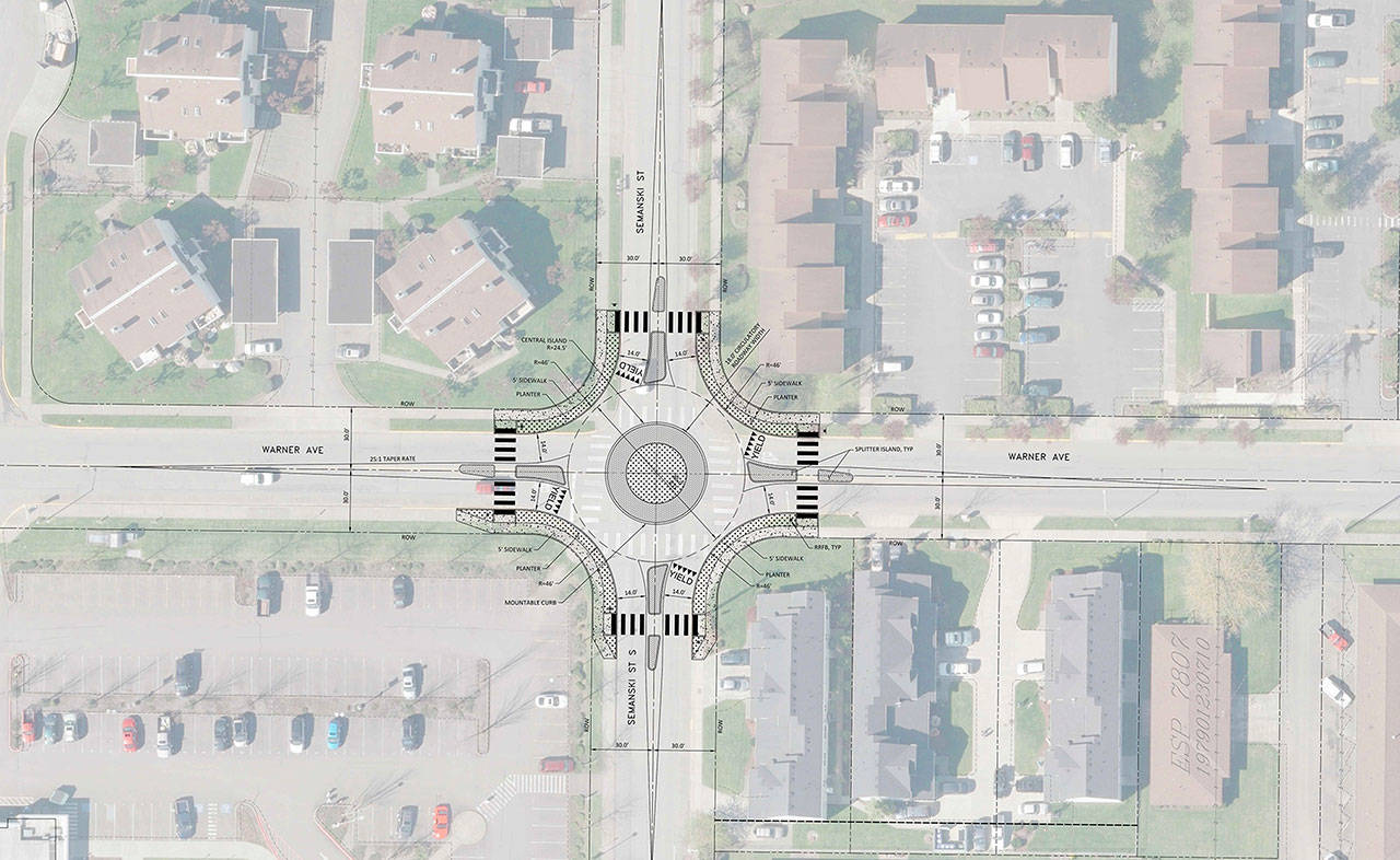 This 2018 preliminary design of the Semanski Street and Warner Avenue roundabout, which when built will control traffic right in front of the Enumclaw High School, has since been updated, but gives an accurate idea of what the project will look like once it’s finished. Image courtesy the city of Enumclaw