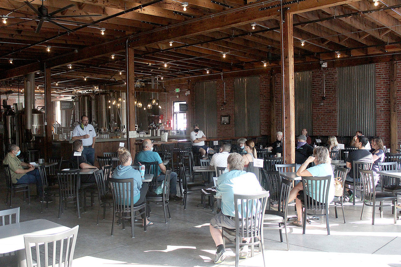 About 40 people gathered at Headworks Brewery on July 30 to discuss how Enumclaw can weather new and future coronavirus restrictions. The next meeting is Aug. 13 at 8:30 a.m. at the same location. Photo by Ray Miller-Still