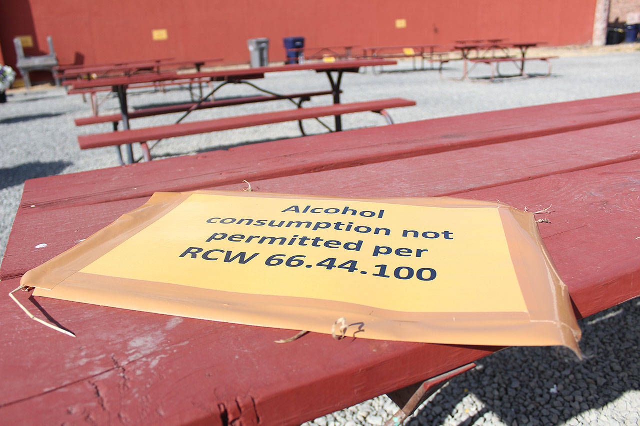 The Enumclaw City Council is considering whether to allow public drinking in this Cole St. and Myrtle Ave. lot, which is currently used for just outside eating. Photo by Ray Miller-Still