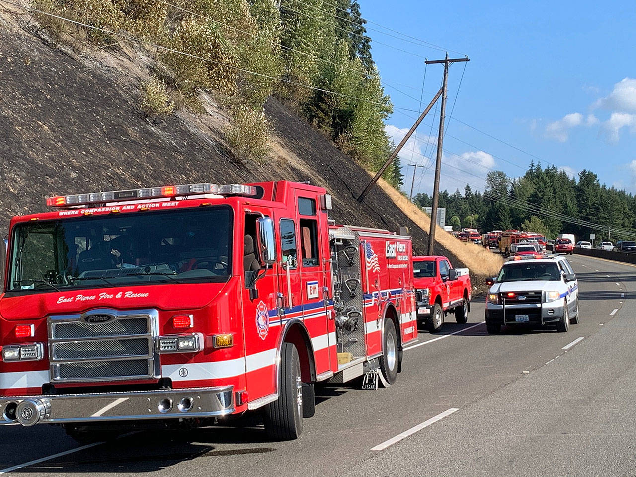 More than 50 first responders, including a regional Strike Team that consists of aid from the Enumclaw Fire Department, aided in putting out a brush fire in Bonney Lake. Photo courtesy East Pierce Fire and Rescue