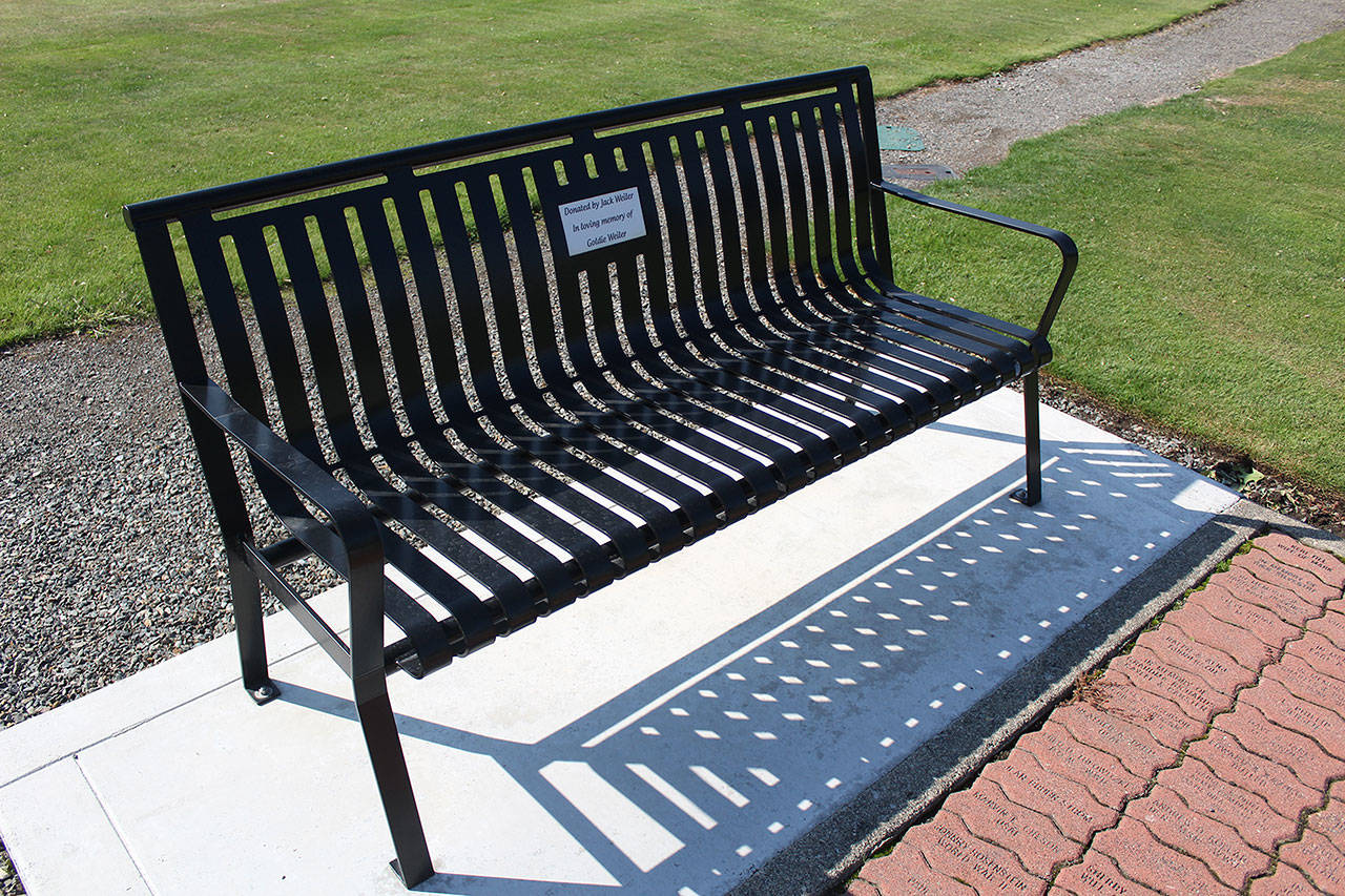 Eight new benches, like the ones at the Veterans Memorial Park, are planned for downtown Enumclaw, each with a memorial plaque attached. Photo by Ray Miller-Still