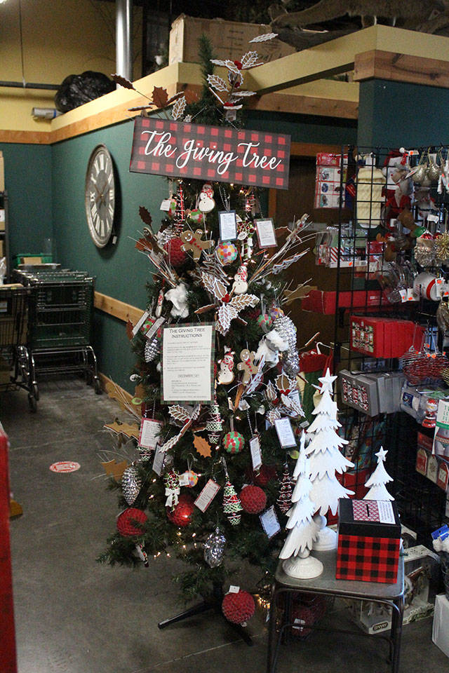 The Giving Tree at Work-Sports & Outdoors still had several gift tags on it for various local kids in need, as of Dec. 4. Photo by Ray MIller-Still