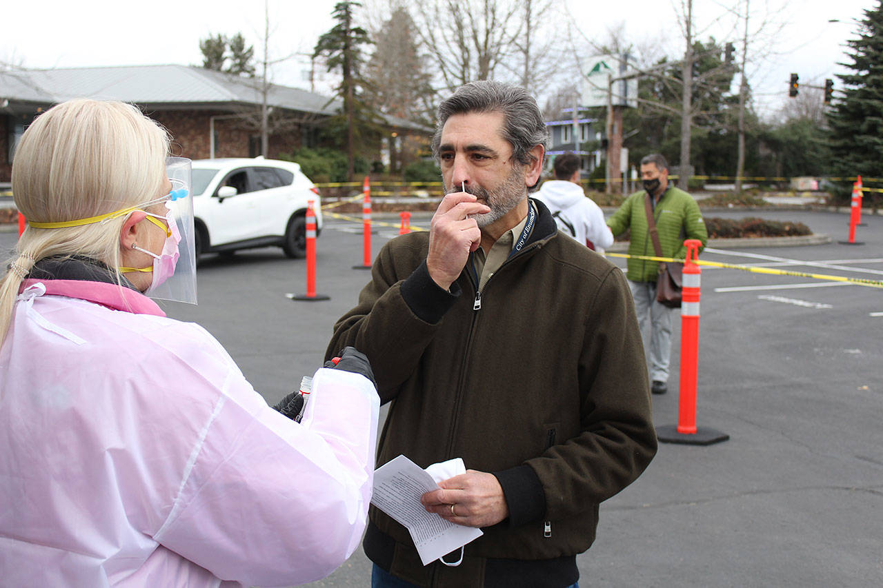 Enumclaw Mayor Jan Molinaro had his first-ever COVID test at the new Enumclaw testing site as its first patient. Photo by Ray Miller-Still