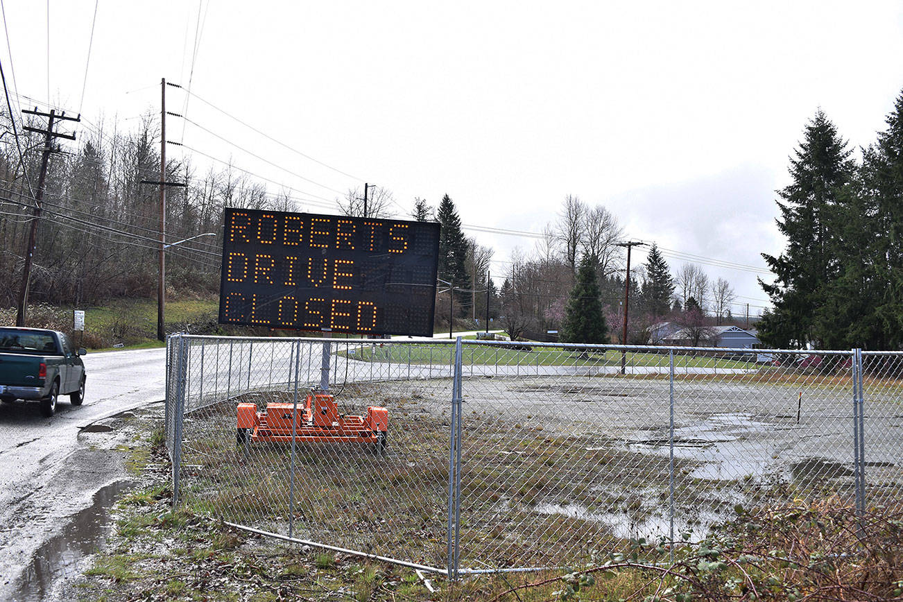 An electronic traffic sign alerts southbound SR 169 drivers that the intersection with Roberts Drive will soon close for road work. Photo by Alex Bruell