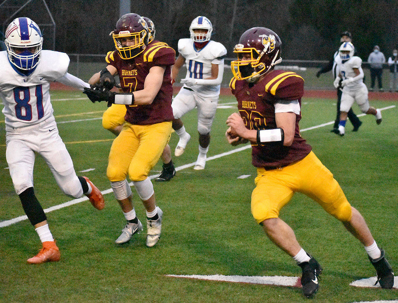 White Rivers Friday night victory over the visiting Washington Patriots was sparked by a ground attack. Photo by Kevin Hanson