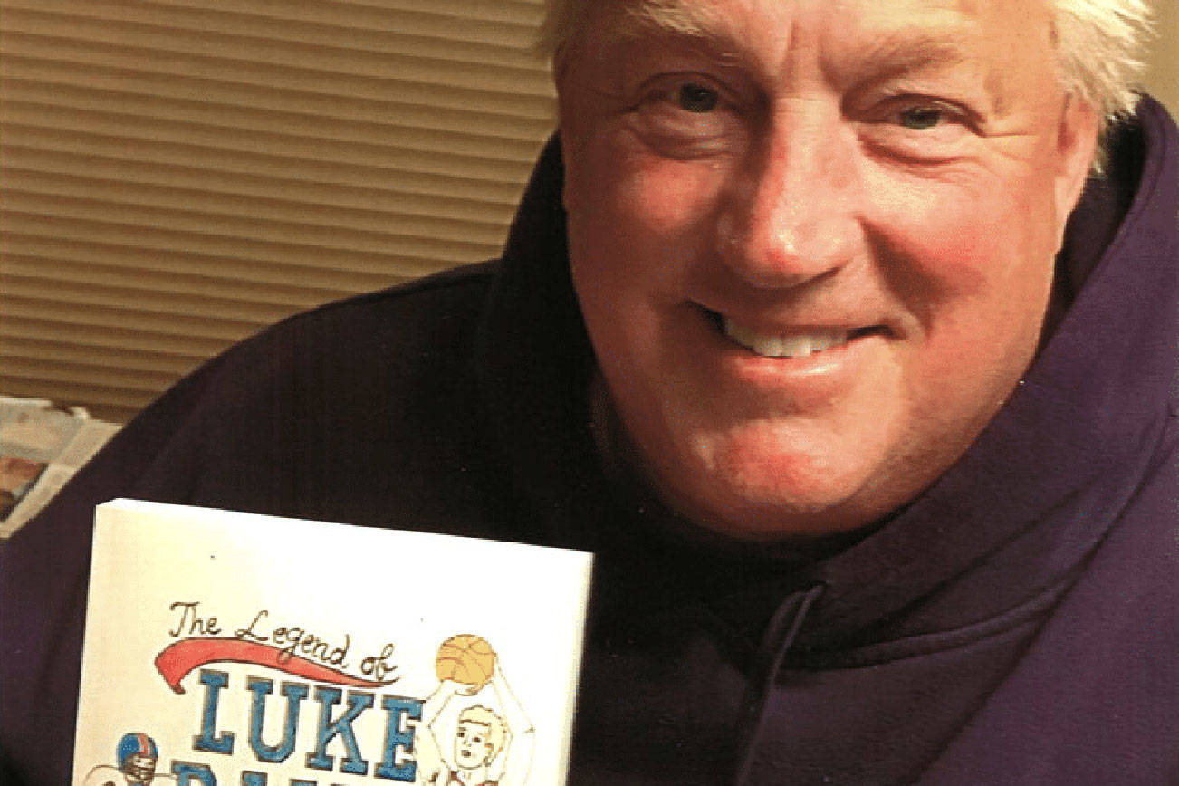 Enumclaw author Matthew McCully holds a copy of his 2019 book "The Legend of Luke Daisy" in this courtesy photo provided to the Courier-Herald.