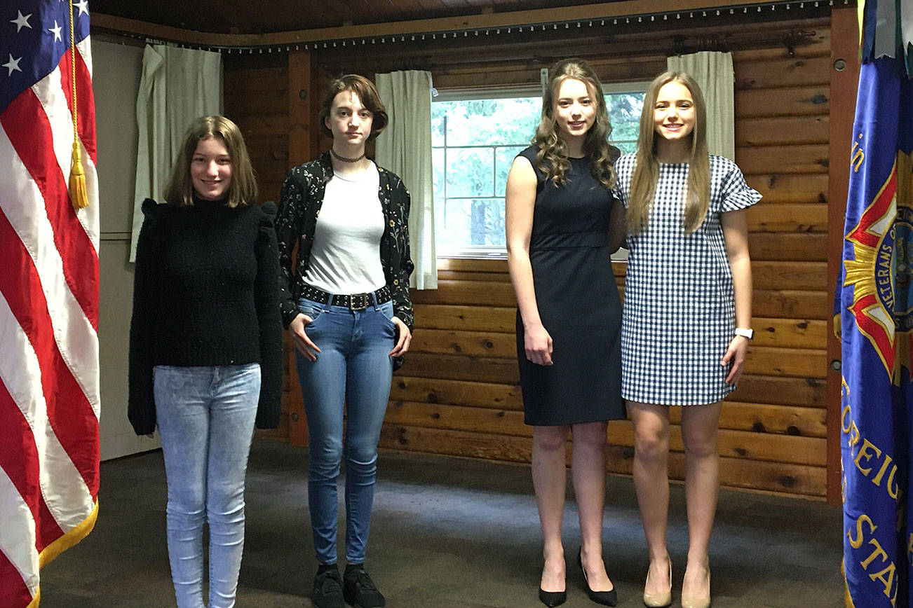 Honored by the local VFW were (from left) Anneliese Knoles, Alyson Holwege, Sophia DeMarco and Natalie DeMarco. They submitted top entries in the VFW's annual essay contests. Photo courtesy VFW Post 1949