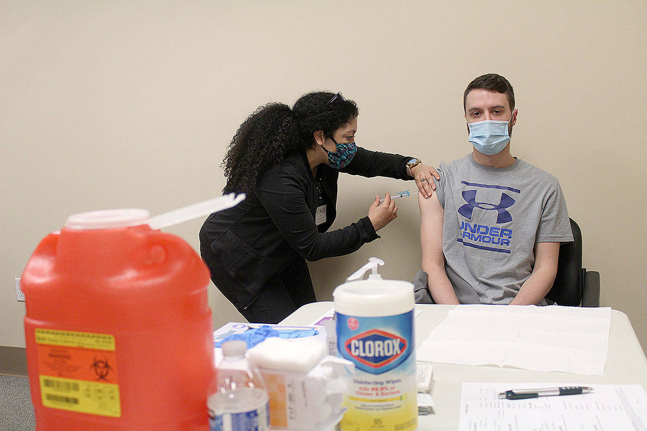 A patient at Dr. Nancy Becker's clinic in Enumclaw receives a vaccine on Friday, April 23. Photo by Ray Miller-Still