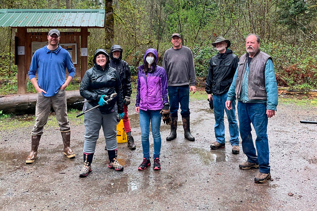 Volunteers geared up to tidy the trails. Submitted photo