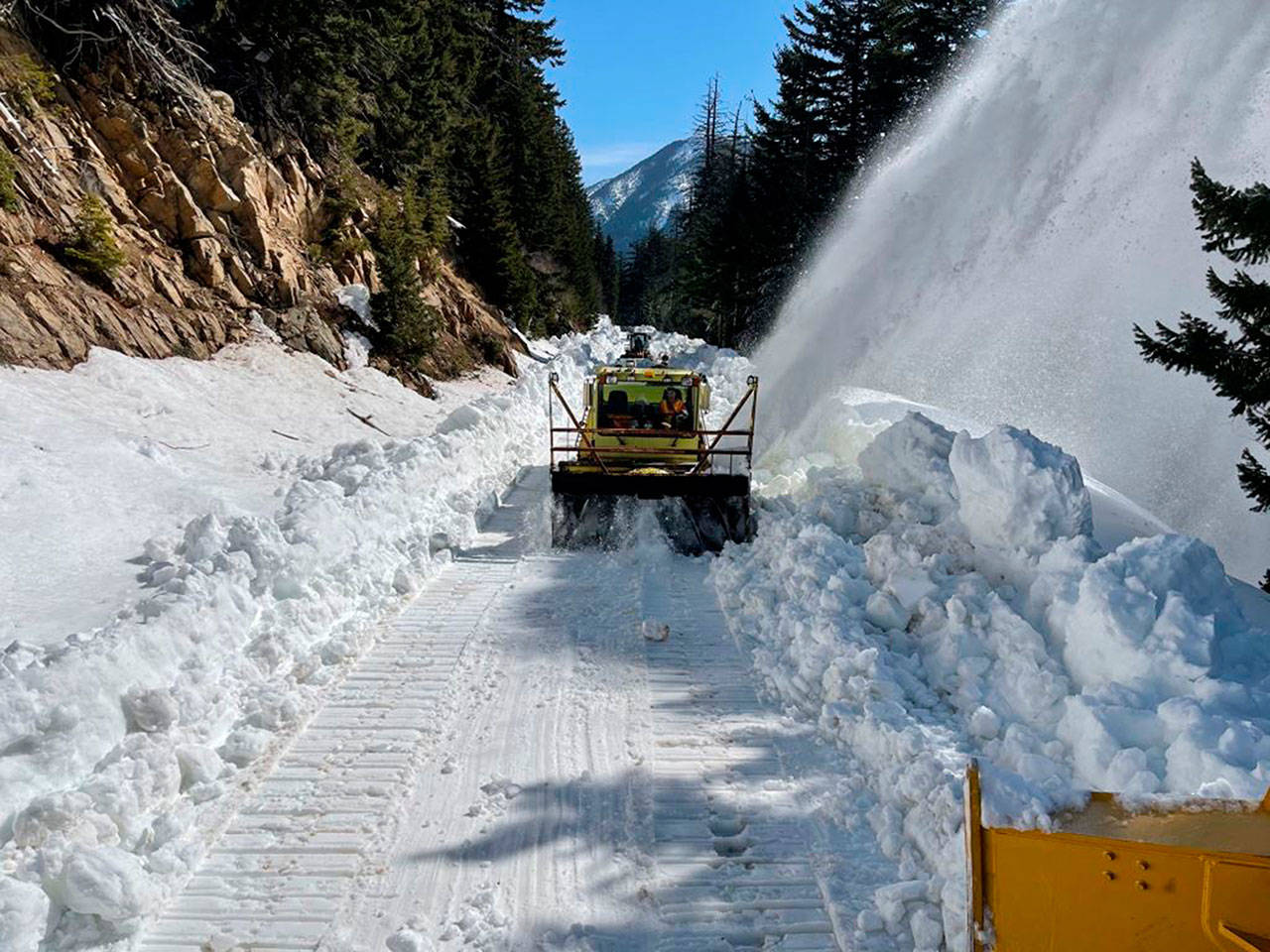 WSDOT workers clearing snow at Chinook Pass this year. Photo by Washington State Department of Transportation