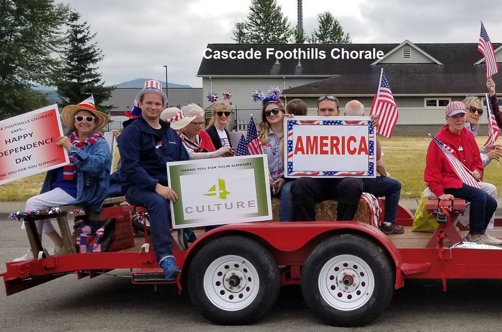 SUBMITTED PHOTO
Cascade Foothills Chorale members show their spirit, and their appreciation, with this entry into Enumclaws 2019 Fourth of July parade.