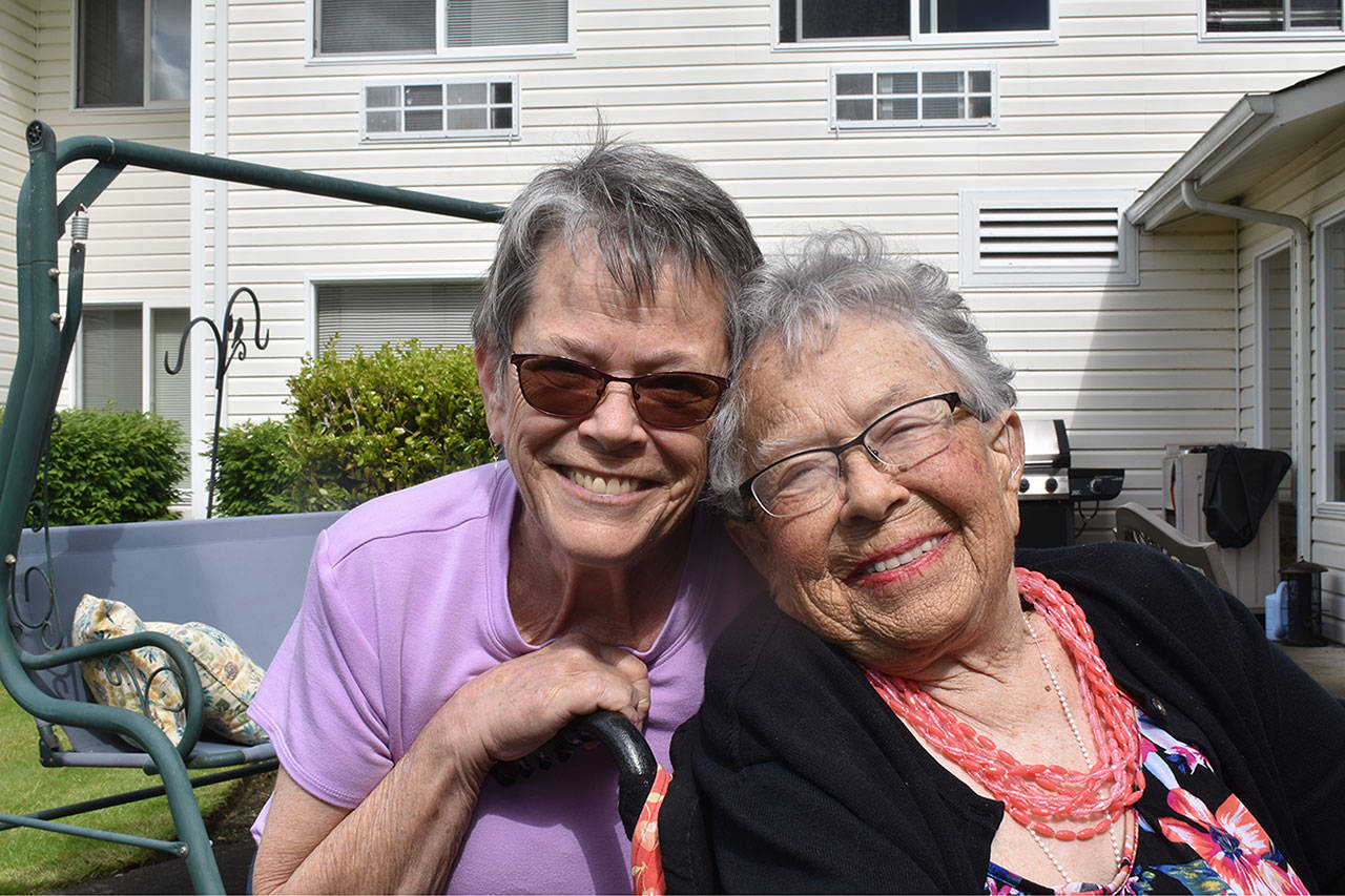 Ann Baker, left, poses for a picture with her mother Elma Gust, who turned 105 in May. Photo by Alex Bruell