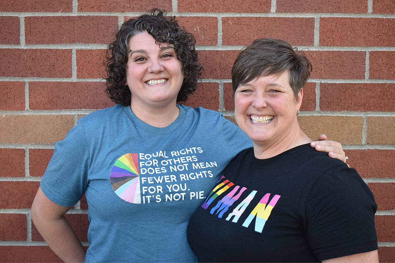 Photo by Alex Bruell 
Raelin Crncevich, left, and Jenny Jones pose for a picture Friday, June 25. The couple are organizers of Plateau Pride, a local organization supporting LGBTQ+ people in the Enumclaw Plateau area.