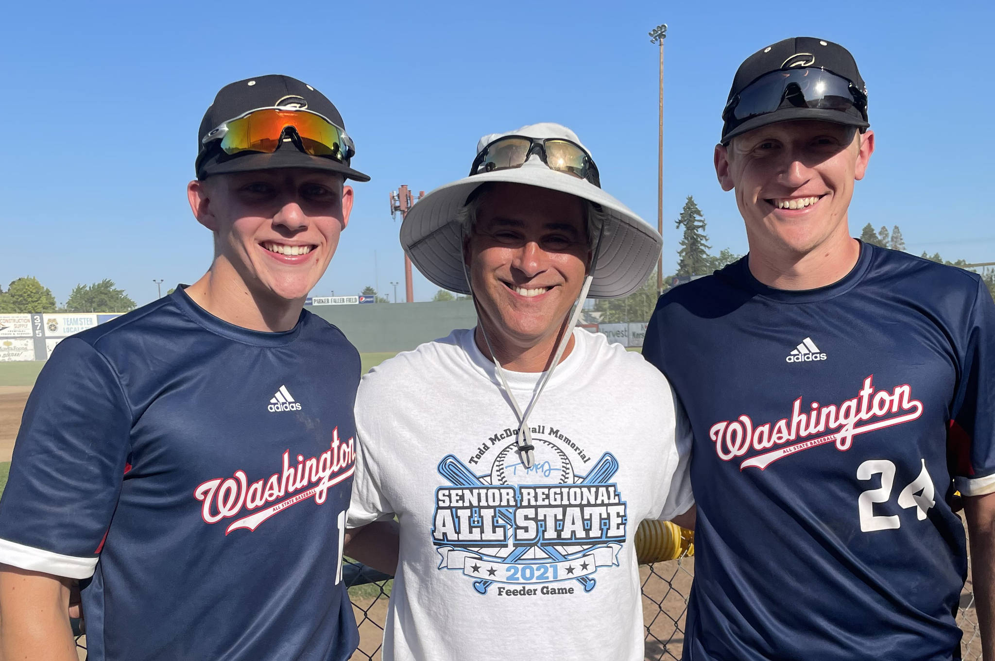 SUBMITTED PHOTO
During the All-State baseball series, Enumclaw High coach Eric Fiedler is flanked by his former players Cole Kaschmitter and Kaden Loop.