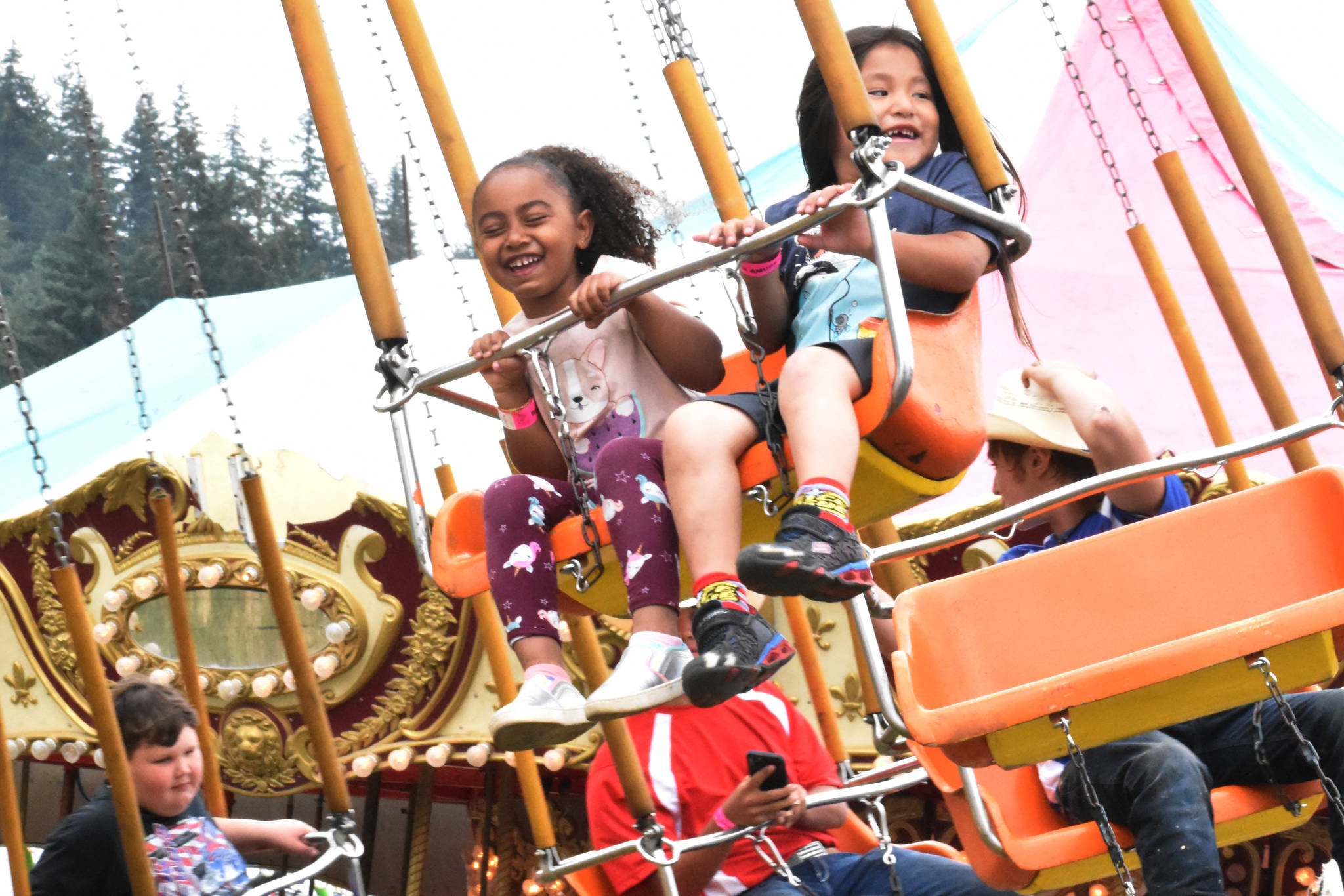 PHOTO BY KEVIN HANSON
Numbers were up across the board during last month's King County Fair, including those who visited the midway and enjoyed carnival rides.