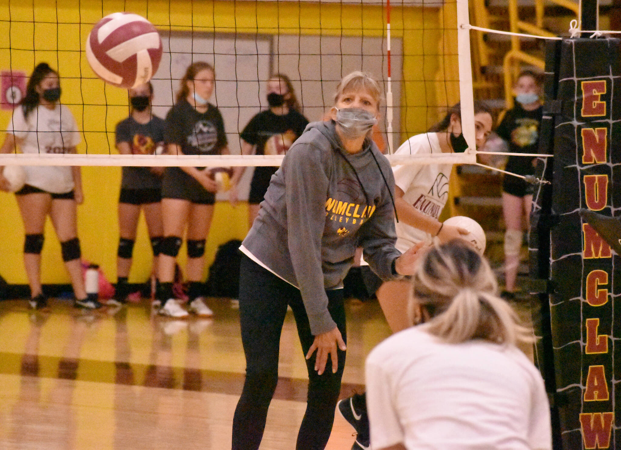 PHOTO BY KEVIN HANSON
Fall coaches have been putting their squads through their early-season paces, all in preparation for the coming campaigns. Above, Enumclaw High volleyball coach Jackie Carel begins a drill.
