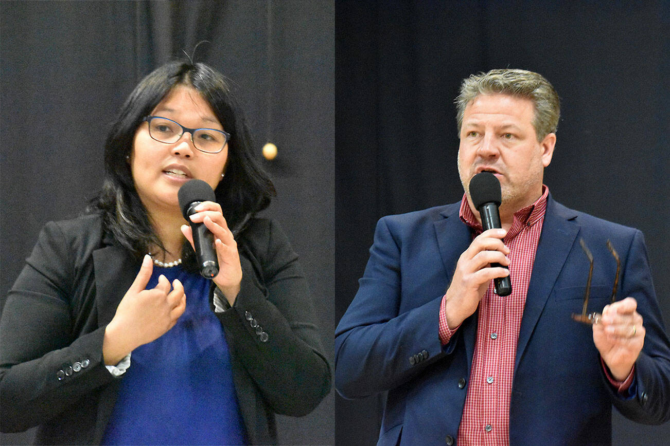 King County Council 9 candidates Kim-Khanh Van (left) and incumbent Reagan Dunn speak during the Courier-Herald’s candidate forum. Photo by Alex Bruell