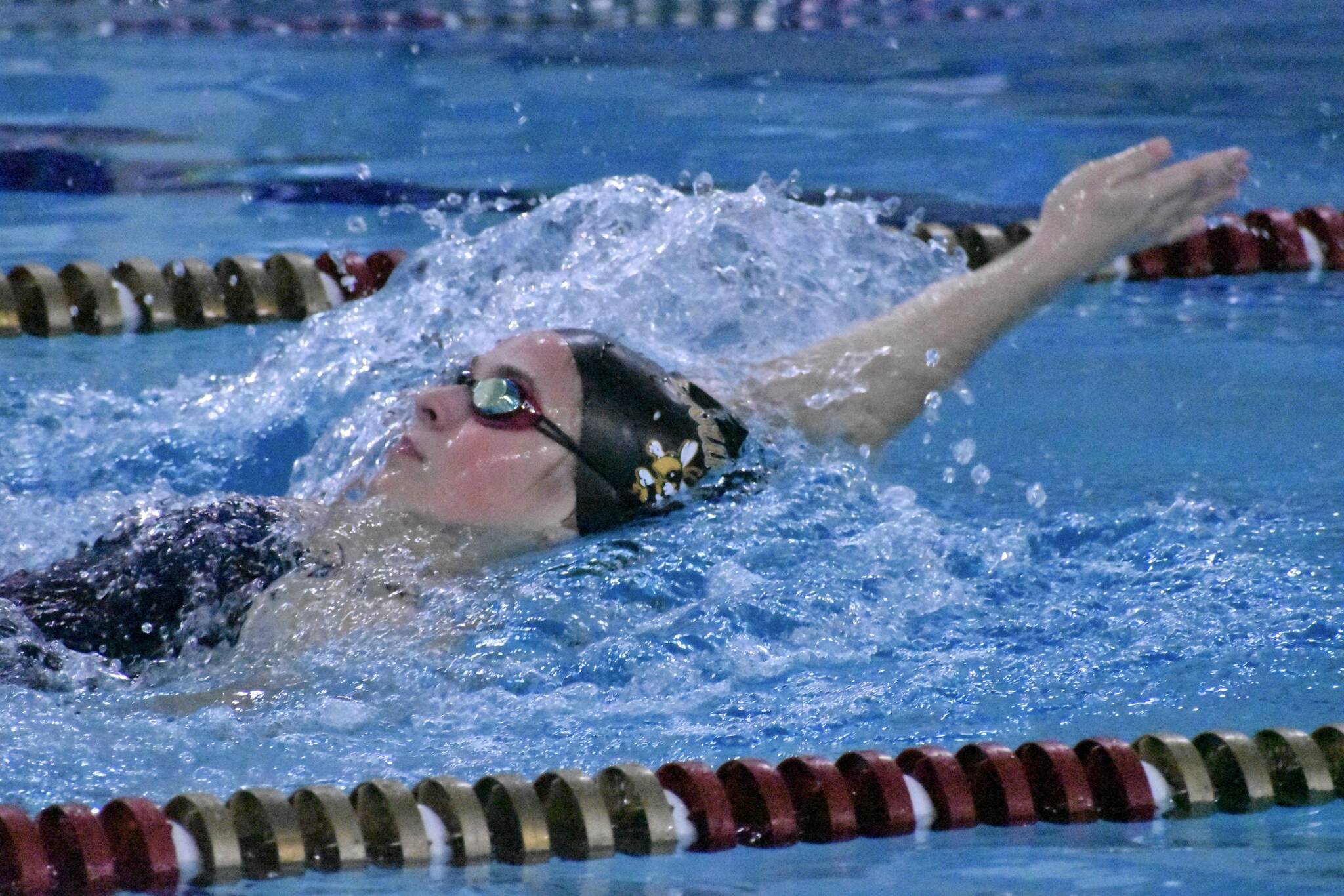 PHOTO BY KEVIN HANSON Cheyenne Fessler has been a steady presence on the local high school swim scene. She’s a member of a combined Enumclaw/White River program that turns out together and competes together, but is scored separately during meets. Fessler, a White River High sophomore, is shown competing in the backstroke earlier this season during a meet at the Enumclaw Aquatic Center.