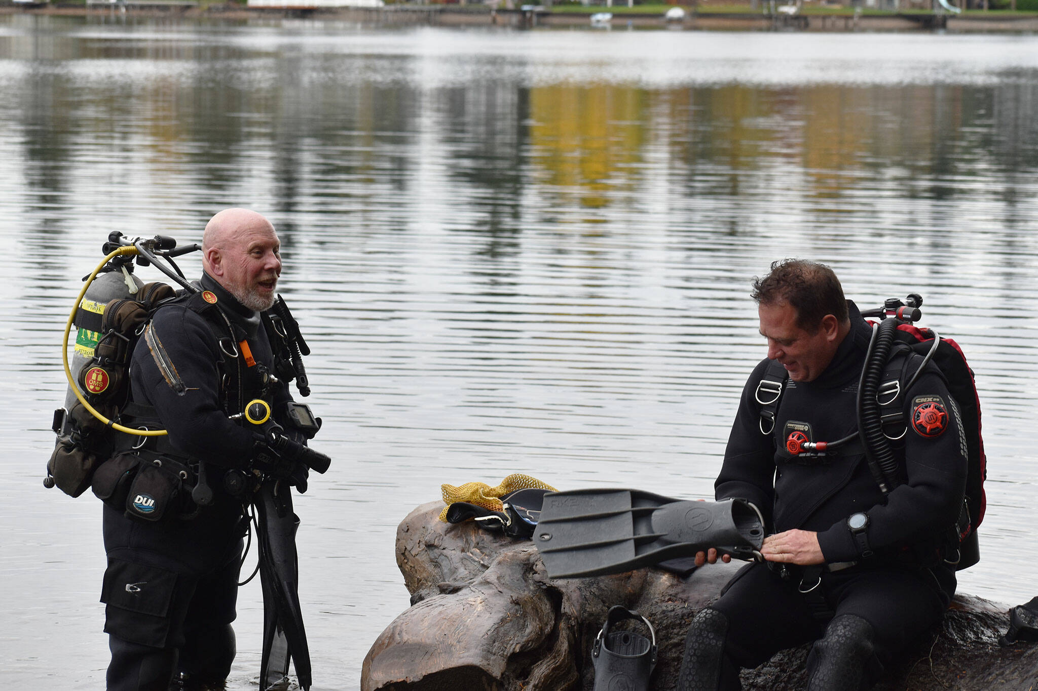 Divers chat before entering Lake Sawyer.