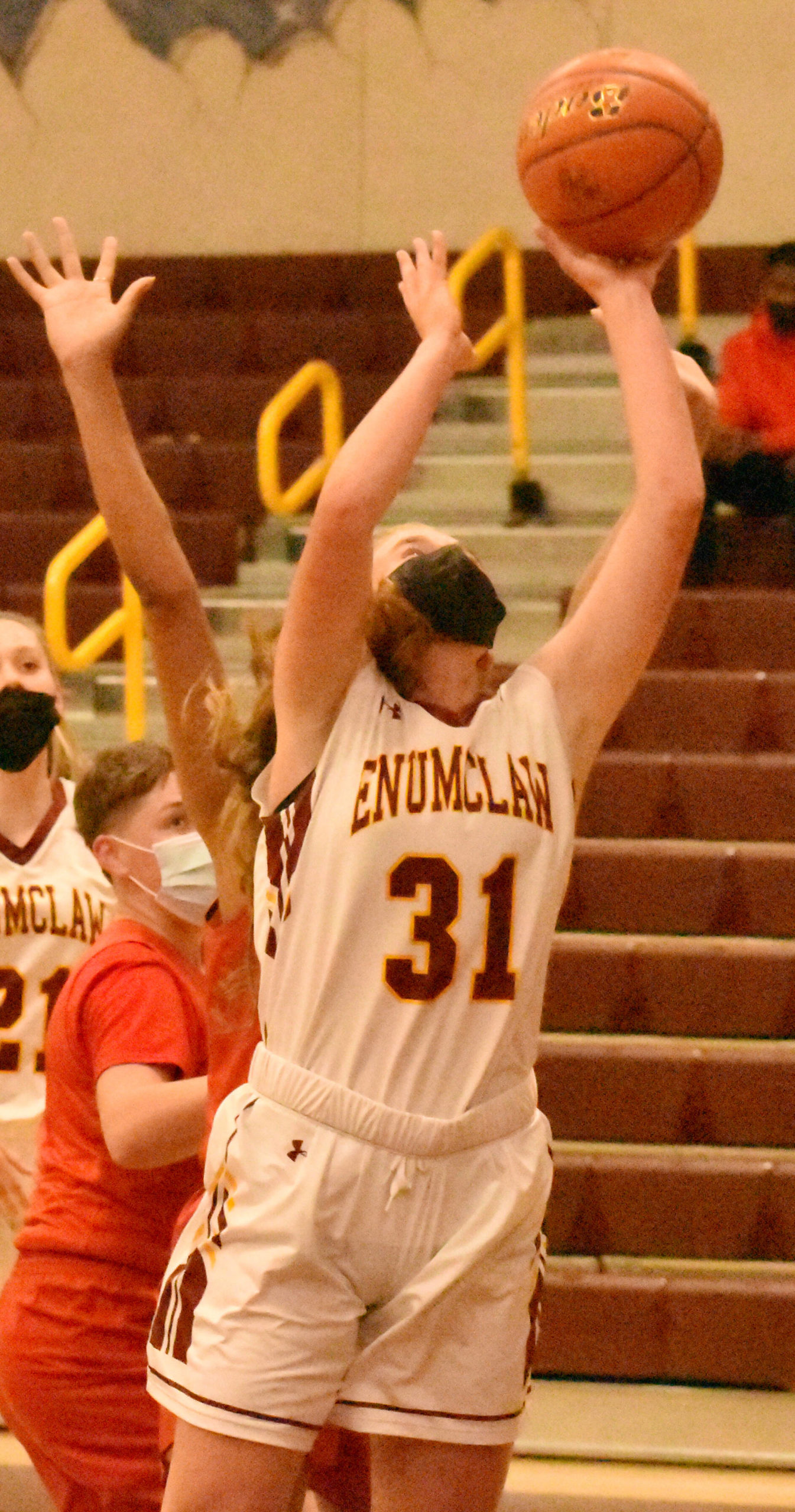 FILE PHOTO BY KEVIN HANSON
One of the Plateau's top returning players is Enumclaw High senior Rosie Penke who earned first team all-league  honors a season ago. Here, she goes up for  two points during a game last season.