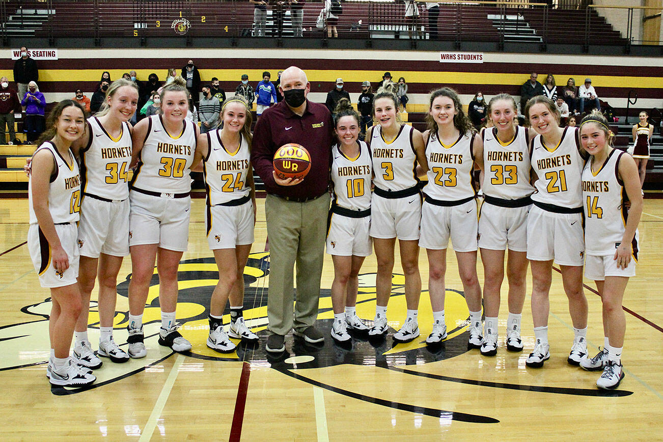 White River coach Chris Gibson was recently honored for his 600th victory as a girls' basketball coach. The win came Friday, Dec. 3, and made Gibson - who is in his 25th season with the Hornets after eight years at Franklin Pierce High School - just the fourth Washington coach to reach 600 wins in the girls' ranks. Submitted photo