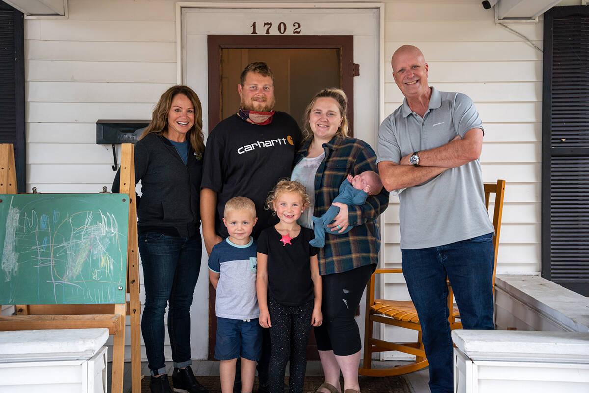 Luke and Sarah Lenihan with daughter Remi (6), son Ryker (4), and newborn son Reuben. Every year, Guardian Roofing helps a family in the community that needs a hand through the Halo Project.