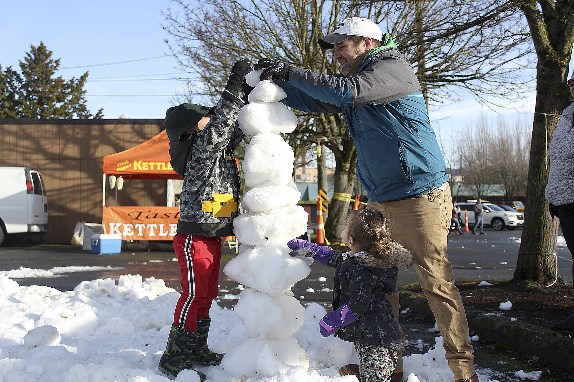 Pictured are kids and families enjoying last year's snow play day. Photos by Ray Miller-Still