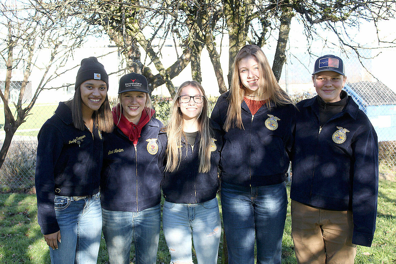FFA leaders Jordyn Thompson, Allison Dofelmier, Liah Arnold, Maddie Blechschmidt, and Cody Seldal standing on the future home of Enumclaw High School’s bee colonies. Not pictured is Alysse Seldal. Photo by Ray Miller-Still