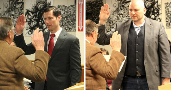 Chris Gruner, right, and Bobby Martines, left, taking their oath of office during the Jan. 10 meeting. Photos by Ray Miller-Still
