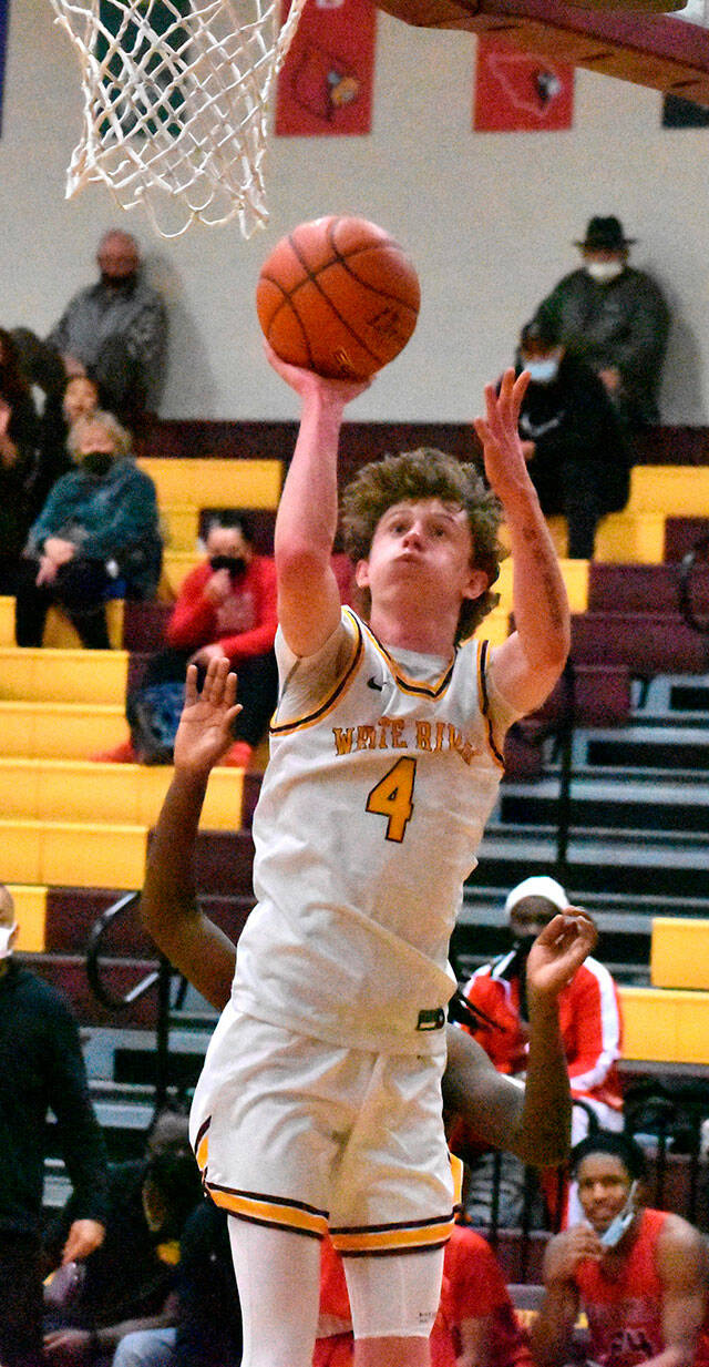 White River High senior Dane Goudy exploded for 44 points during a Feb. 8 game at Steilacoom, helping his Hornets remain undefeated in South Puget Sound League 2A play. According to White River coach Zach Johnson, Goudy’s offensive outburst now tops the Hornet boys’ basketball record book for single-game scoring. Photo by Kevin Hanson
