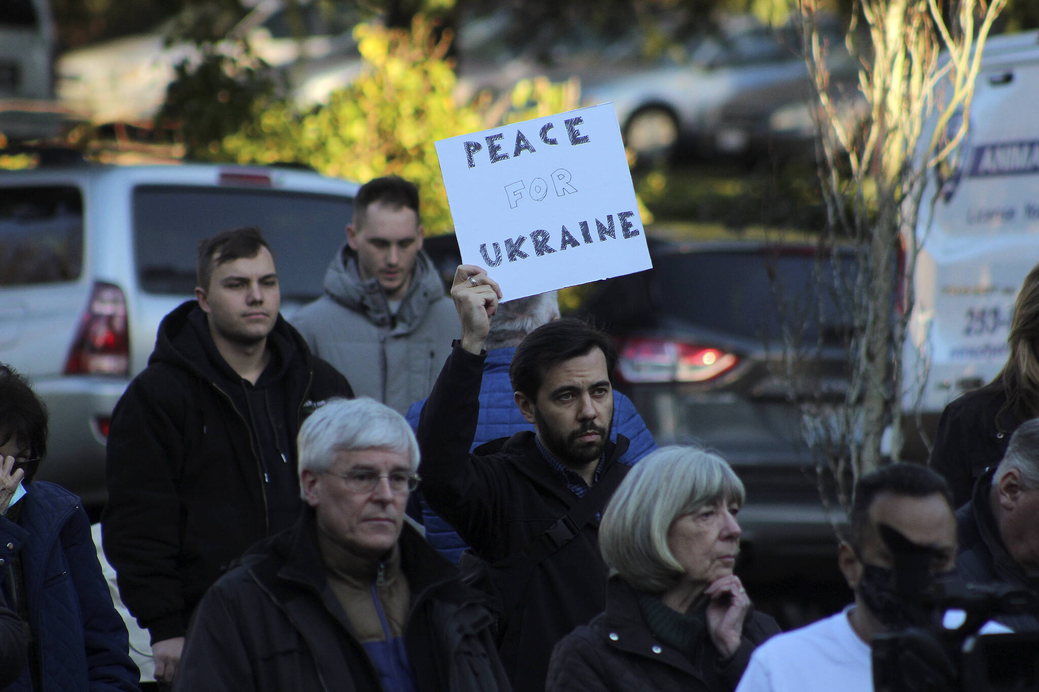 Igor Soloydenko, who said he identifies as Russian, holds a sign urging Peace for Ukraine at a ceremony Feb. 25 in Federal Way. Soloydenko said: Theres just so much shame. I feel helpless in the way I cannot change anything in my home country. It was unimaginable that Russia would do such a thing. Olivia Sullivan/Sound Publishing
