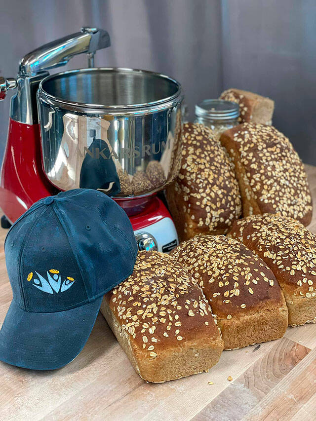 Bakers for Community Loaves make one kind of loaf — honey oat sandwich loaves — to provide recipients with a nutrient-dense bread for their meals. Courtesy photo Community Loaves