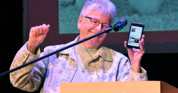 Trena Page, a teacher and coach from 1974 to 1993, accepts her award at the induction ceremony. Photo by Kevin Hanson