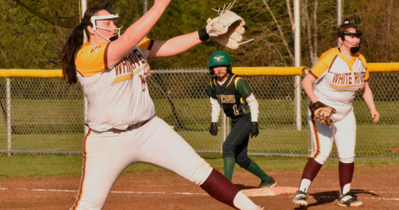 The White River girls jumped out to an undefeated start of the fastpitch season, going 5-0 through games of last week (4-0 in SPSL 2A play). Among the reasons was the pitching of freshman Elliotte Kajita, shown here delivering during an 18-0, home-field victory on March 22. She picked up another victory two days later when the Hornets defeated Steilacoom. Kajita didn't allow an earned run in either contest while striking out 13 and issuing just one base on balls. Photo by Kevin Hanson