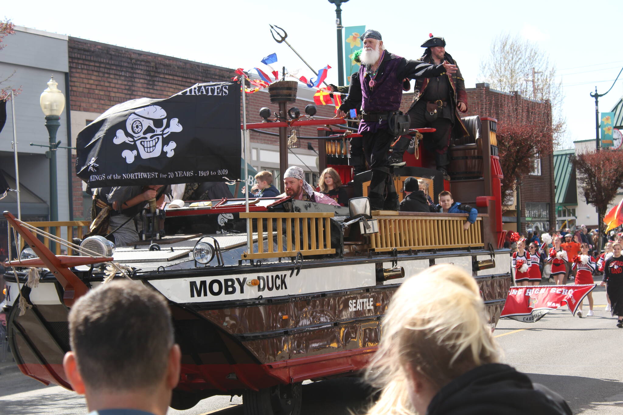 Pirates claim the roadway as the parade makes its way through Sumner. Photo by Ray-Miller Still