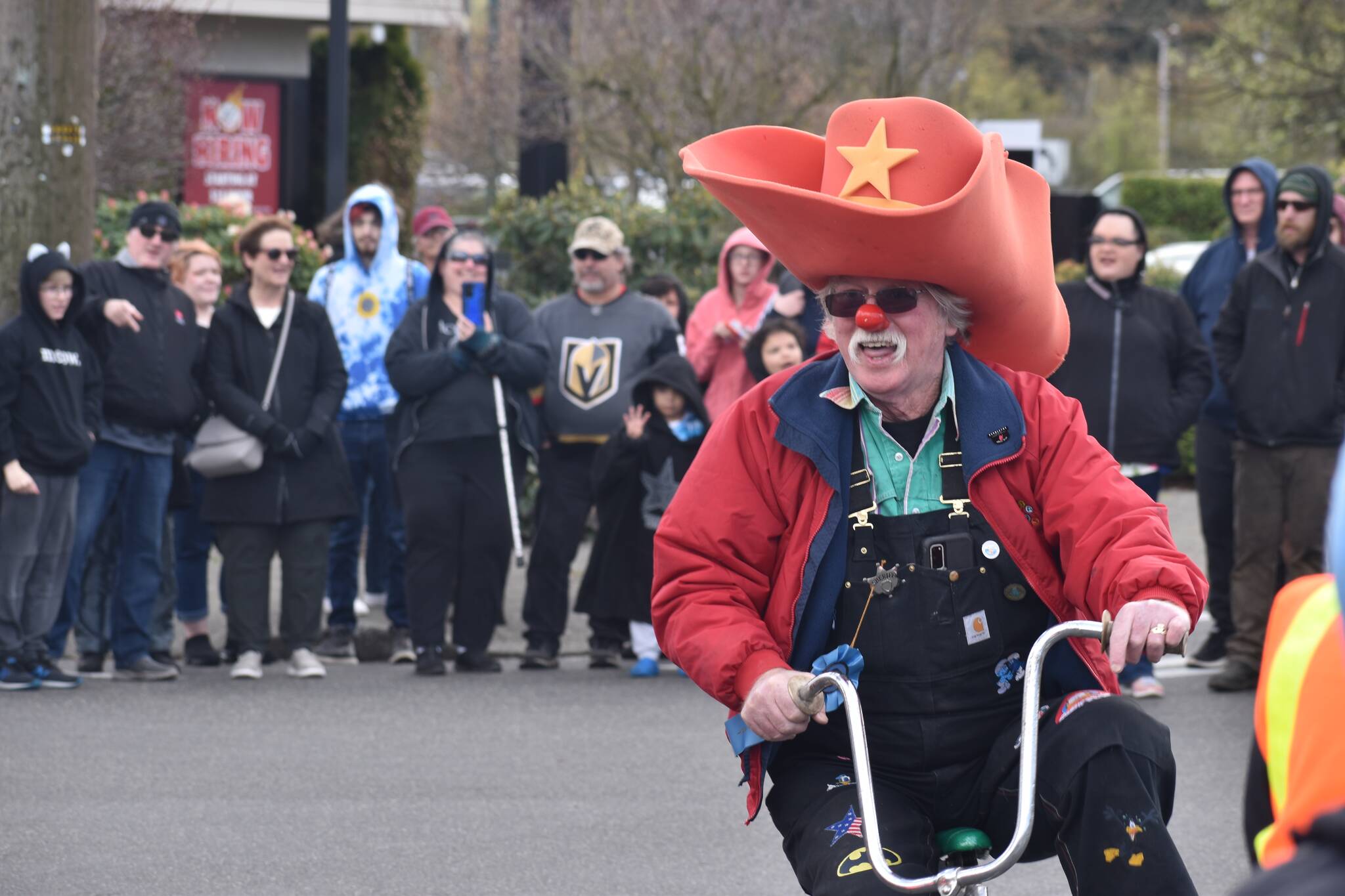 Clowns took to the streets during the Daffodil Parade in Puyallup. Photo by Alex Bruell
