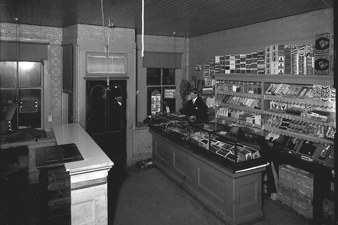 The Enumclaw business scene is unrecognizable since the local Chamber opened in 1902. Pictured the old Eagle Candy Store in 1906