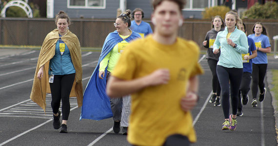 Photo by Ray Miller-Still 
The Enumclaw community gathered on the high school’s track last Friday to run thirteen laps — or 5 kilometers — to help raise money for World Relief Seattle and goes to aid Ukraine refugees. As of April 17, more than $1,800 was raised.