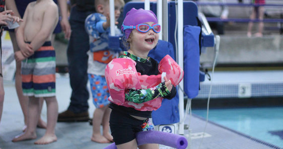 Whether you're at the pool or the beach, water safety is paramount — which is why the Enumclaw Aquatic Center hosted April Pool's Day on April 16, teaching kids of all ages the importance of a properly-fitted life jacket, how to rescue someone with a life preserver, and how to get in and out of a boat safely. Pictured is Eve Funk, rocking her her pool fit. Photo by Ray Miller-Still