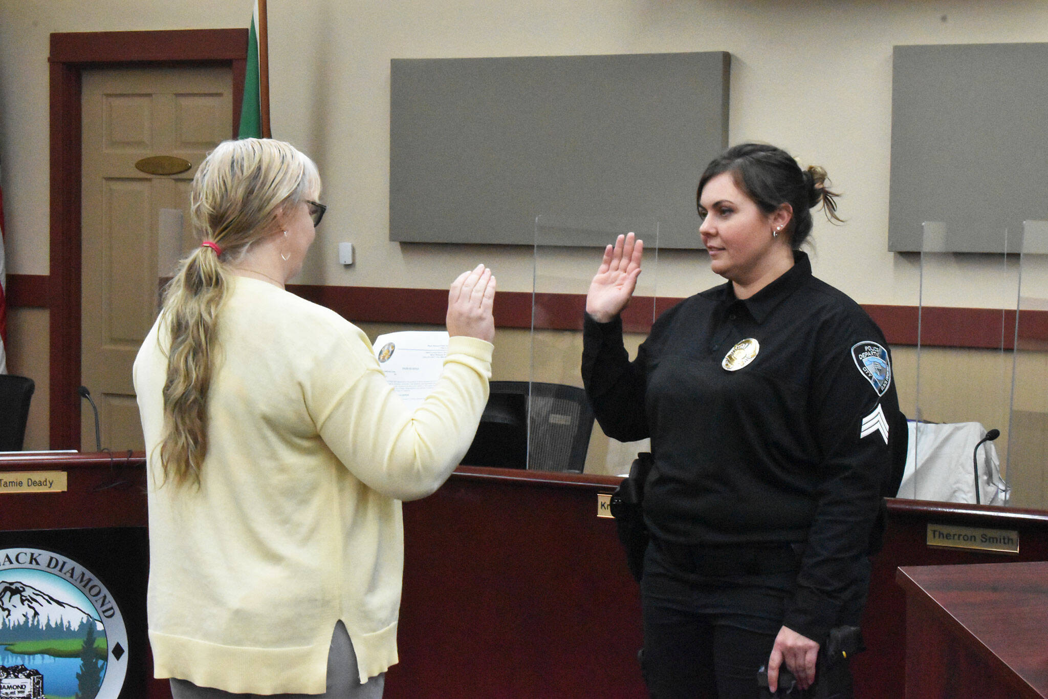 Black Diamond police officer Lacey Del Valle is sworn in as a sergeant during the June 2 council meeting. Photo by Alex Bruell