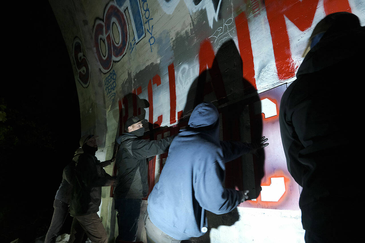 Michael Colton Brown and several other Patriot Front members allegedly came to the Enumclaw area to practice their stenciling under a bridge. Photo metadata from the event shows the bridge to be located in the Kanaskat area outside Black Diamond, but the Courier-Herald was unable to independently locate the bridge. Photo provided by Unicorn Riot