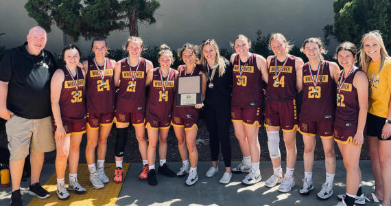 The White River varsity squad won five straight games in San Diego to take the tournament championship. Making up the squad were (from left) coach Chris Gibson, Dakota Sprouse, Josie Jacobs, Ava Bright, Lexie Banks, Morgan Greene, Mackenzie Hinson, Ella Klemkow, Vivian Kingston, Ally Green, Jadyn Olson, and assistant coach Rani Wiegand. Submitted photo